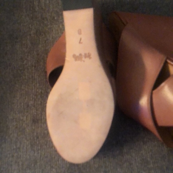Coach leather slip in shoes.  I am a 7.5 and they fit me and are so comfortable! - Picture 3 of 7